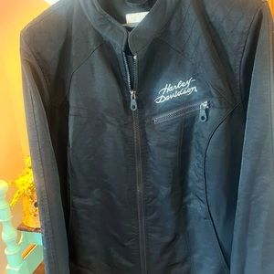 Ladies Harley Davidson light jacket. Black with silver stitching.